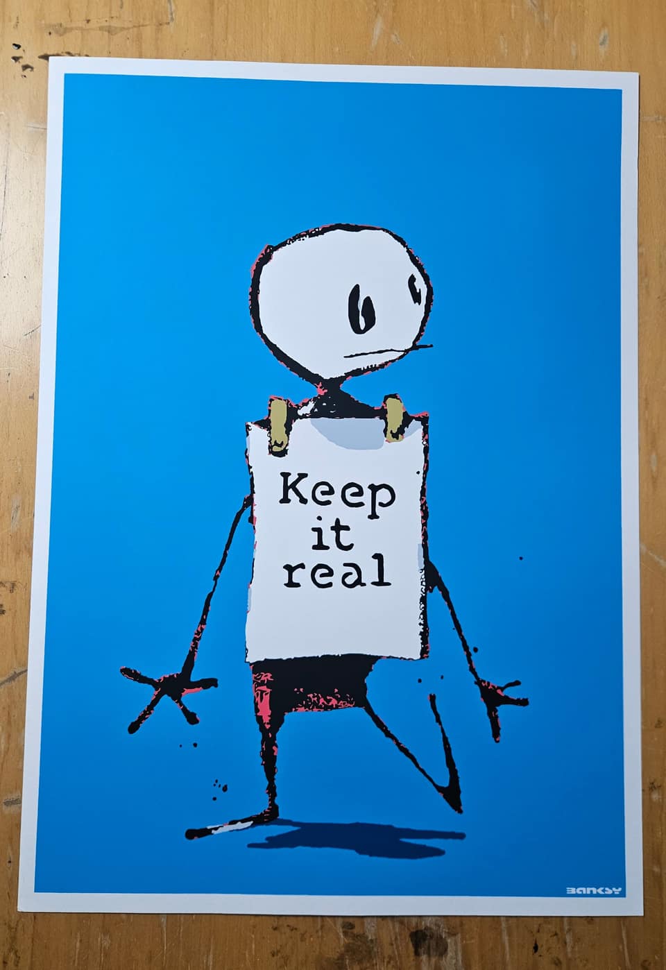D’après Banksy, Keep It Real.